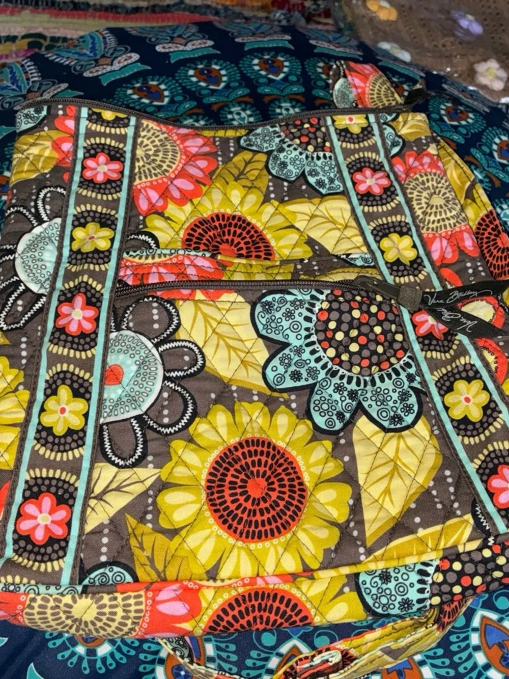 Vera Bradley Quilted Bag with Teal Floral Pattern on Brown
